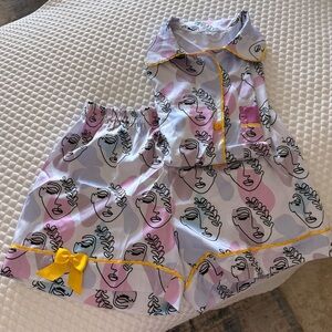 New, unworn, Silk Stylish Women's Face Print Pajama Set, Pink and Yellow Accents